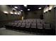 Private movie theater features tiered seating and surround sound at 4105 Limerick Dr, Lake Wales, FL 33859
