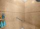 The accessible shower features grab bars and a built-in bench for added safety and convenience at 4105 Limerick Dr, Lake Wales, FL 33859