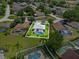 Back aerial view of home showcasing private pool, screen, and backyard at 419 Wellesly Dr, Davenport, FL 33897