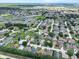 High aerial view of a residential area showcasing the location of this home within the neighborhood at 419 Wellesly Dr, Davenport, FL 33897