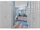 Bathroom with wood floors, neutral walls, and shower-tub combo at 419 Wellesly Dr, Davenport, FL 33897