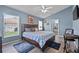The main bedroom features a large window and spacious design at 419 Wellesly Dr, Davenport, FL 33897