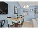 Comfortable dining area with view to living room and access to the kitchen at 419 Wellesly Dr, Davenport, FL 33897