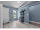 Kitchen or breakfast nook has large tile flooring and exterior access at 419 Wellesly Dr, Davenport, FL 33897