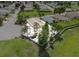 Charming single-story home featuring well-manicured landscaping and a quaint, fenced backyard at 452 Lake Suzanne Dr, Lake Wales, FL 33859