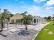 The home has an amazing outdoor space including a patio with a swing and lake views at 452 Lake Suzanne Dr, Lake Wales, FL 33859
