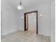 Dining room featuring tile flooring, sconces, and a view into the adjacent room at 452 Lake Suzanne Dr, Lake Wales, FL 33859