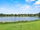 Beautiful view of a lake with lush green surroundings at 452 Lake Suzanne Dr, Lake Wales, FL 33859