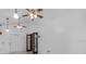 Spacious living room with double doors and neutral paint at 452 Lake Suzanne Dr, Lake Wales, FL 33859