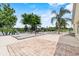 The spacious patio has brick pavers, a swing and an amazing lake view at 452 Lake Suzanne Dr, Lake Wales, FL 33859
