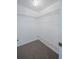Walk-in closet with carpet flooring and wire shelving for storage at 455 Manor Dr, Bartow, FL 33830
