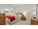 Bright bedroom boasts neutral colors, and lots of natural light with a beautiful view at 464 Lake Suzanne Dr, Lake Wales, FL 33859
