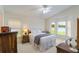 Bright bedroom boasts neutral colors, vaulted ceilings, and lots of natural light with a view at 464 Lake Suzanne Dr, Lake Wales, FL 33859