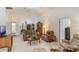 Cozy living room featuring plush seating, natural light, and a neutral color palette at 464 Lake Suzanne Dr, Lake Wales, FL 33859