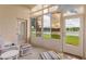 Enclosed patio with stunning lake views and plenty of natural light at 464 Lake Suzanne Dr, Lake Wales, FL 33859