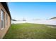 The spacious backyard is enclosed by a white vinyl fence, offering privacy at 4662 Osprey Way, Winter Haven, FL 33881