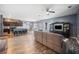 Spacious living area with an open layout connecting to the modern kitchen at 4662 Osprey Way, Winter Haven, FL 33881