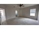 Spacious main bedroom featuring a ceiling fan, and a window that offers natural light at 4747 Mandolin Loop, Winter Haven, FL 33884