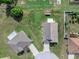 Overhead view of the house and its fenced-in yard, as well as the neighborhood at 5424 Moon Valley Dr, Lakeland, FL 33812