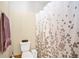 Bathroom featuring a shower, toilet, and vanity with decor at 5424 Moon Valley Dr, Lakeland, FL 33812