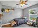 Comfortable room featuring natural light, floating shelves and a pet bed at 5424 Moon Valley Dr, Lakeland, FL 33812