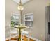 Cozy kitchen nook with large windows providing scenic backyard views and natural light at 5424 Moon Valley Dr, Lakeland, FL 33812