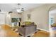 Cozy living room with comfortable seating and a television on a modern stand at 5424 Moon Valley Dr, Lakeland, FL 33812