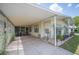 Covered carport featuring ample parking space and convenient access to the front door and side entry at 6027 Grand Oaks Se Dr, Winter Haven, FL 33884