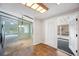 Open-concept dining area with tile flooring and easy access to the living room and screened porch at 6027 Grand Oaks Se Dr, Winter Haven, FL 33884