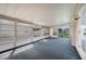 Enclosed sunroom with abundant natural light and cozy carpeting at 6027 Grand Oaks Se Dr, Winter Haven, FL 33884