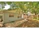 Backyard shows spacious outdoor living space with patio, and greenery at 658 Lake Dexter Cir, Winter Haven, FL 33884