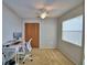 Bedroom features a ceiling fan, and natural light from a window at 658 Lake Dexter Cir, Winter Haven, FL 33884