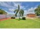 Community pool for residents with lounge seating and a lake view at 658 Lake Dexter Cir, Winter Haven, FL 33884