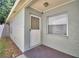 Side door entrance with classic design at 658 Lake Dexter Cir, Winter Haven, FL 33884