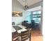 Cozy dining area features an office space, stylish decor, and ample natural light at 7906 Waterview Way # 7906, Winter Haven, FL 33884