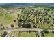 Aerial view of property with mature trees. Excellent building sites available at 836 S Lake Starr Blvd, Lake Wales, FL 33898