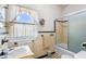 Bathroom shows a sink, shower, and window at 836 S Lake Starr Blvd, Lake Wales, FL 33898