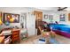 Comfortable bedroom with a full bed, desk and natural light at 836 S Lake Starr Blvd, Lake Wales, FL 33898