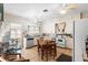 Spacious kitchen featuring a dining area, dishwasher, vintage range, and ample counter space at 836 S Lake Starr Blvd, Lake Wales, FL 33898