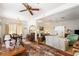 Open-concept living and dining areas featuring hardwood floors at 836 S Lake Starr Blvd, Lake Wales, FL 33898