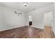 Spacious bedroom with hardwood floors, plenty of light, and attached bathroom at 8720 Micmac Ct, Polk City, FL 33868
