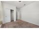Bedroom featuring a closet and neutral paint throughout at 8720 Micmac Ct, Polk City, FL 33868