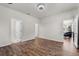Bedroom featuring hardwood floors and plenty of natural light at 8720 Micmac Ct, Polk City, FL 33868