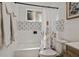 Beautiful bathroom with tub and shower combination, updated fixtures, and stylish design at 914 Mangham Rd, Babson Park, FL 33827