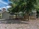 Charming single-story home with a wooden deck and mature trees providing shade at 914 Mangham Rd, Babson Park, FL 33827