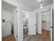 This hallway provides access to a bathroom, closet, and other rooms in the home at 914 Mangham Rd, Babson Park, FL 33827