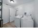 This dedicated laundry room features a washer and dryer for convenient chore completion at 914 Mangham Rd, Babson Park, FL 33827