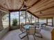 Relaxing screened porch with views of the lake and surrounding landscape at 914 Mangham Rd, Babson Park, FL 33827