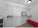 This walk-in closet features ample wire shelving for efficient storage solutions for clothing and accessories at 914 Mangham Rd, Babson Park, FL 33827