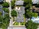 Aerial view of a home showcasing its well-maintained yard and surrounding neighborhood at 103 Se Tuscawilla Ave, Ocala, FL 34471